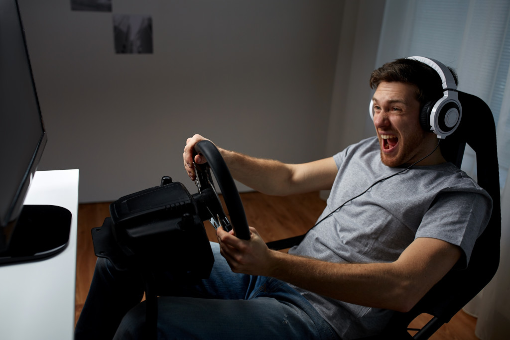 man playing video game